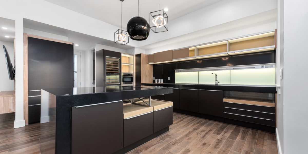 Image of an Ultramodern Open Concept Kitchen Featuring Burgundy Cabinets, Ultra-Luxury Appliances, and Elegant Hardwood Floors - A Stunning Blend of Contemporary Design and High-End Functionality